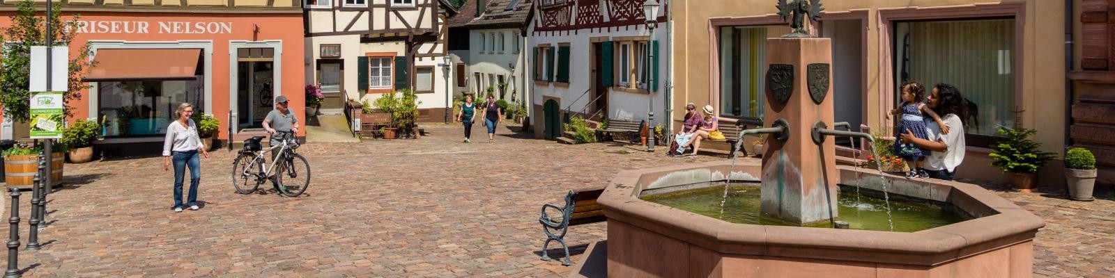 Begegnungen auf dem sonnigen Marktplatz