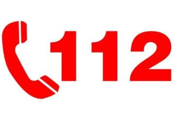 Roter Telefonhörer neben der Telefonnummer 112