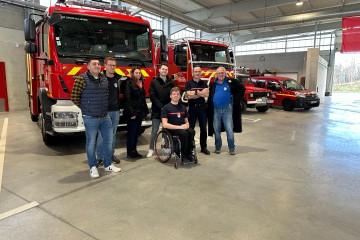 Gruppenfoto in der Fahrzeughalle
